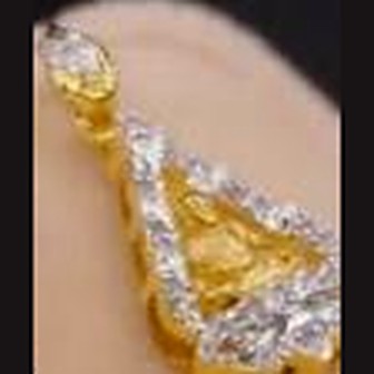 Triangular gold amulet frame set with white stones