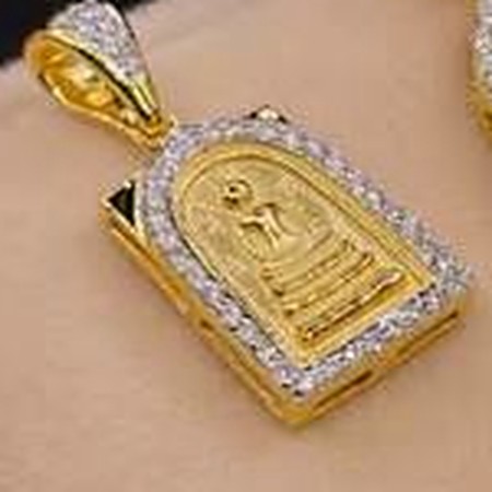 Gold Buddha amulet frame set with white stones